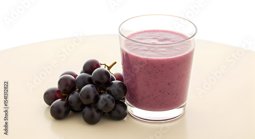 Wallpaper Mural Purple Grape Smoothie in a Clear Glass Alongside a Bunch of Fresh Dark Grapes on a Light Neutral Surface with White Background Torontodigital.ca