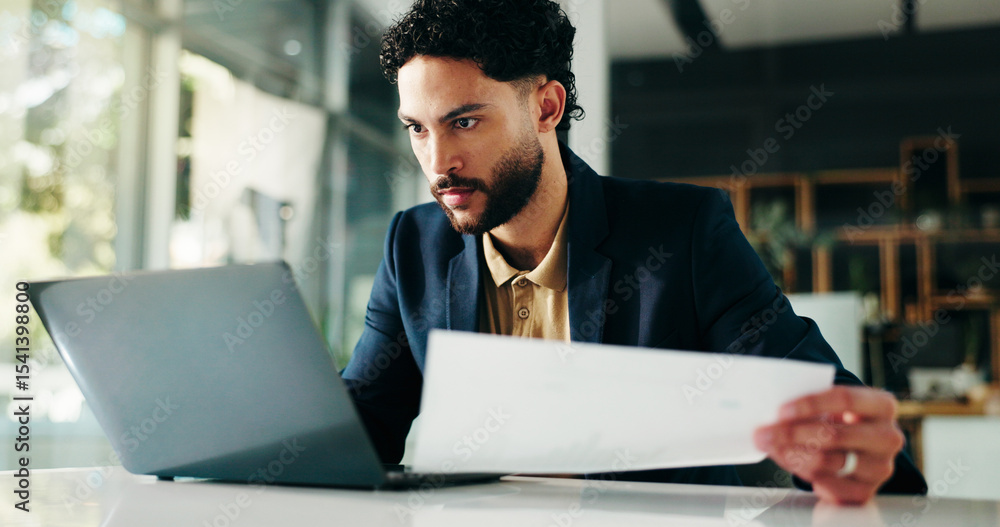 © peopleimages.com - Businessman, accountant and laptop with documents for finance, statistics or review at office. Man, employee or accounting with computer or paperwork for financial planning, company budget or report