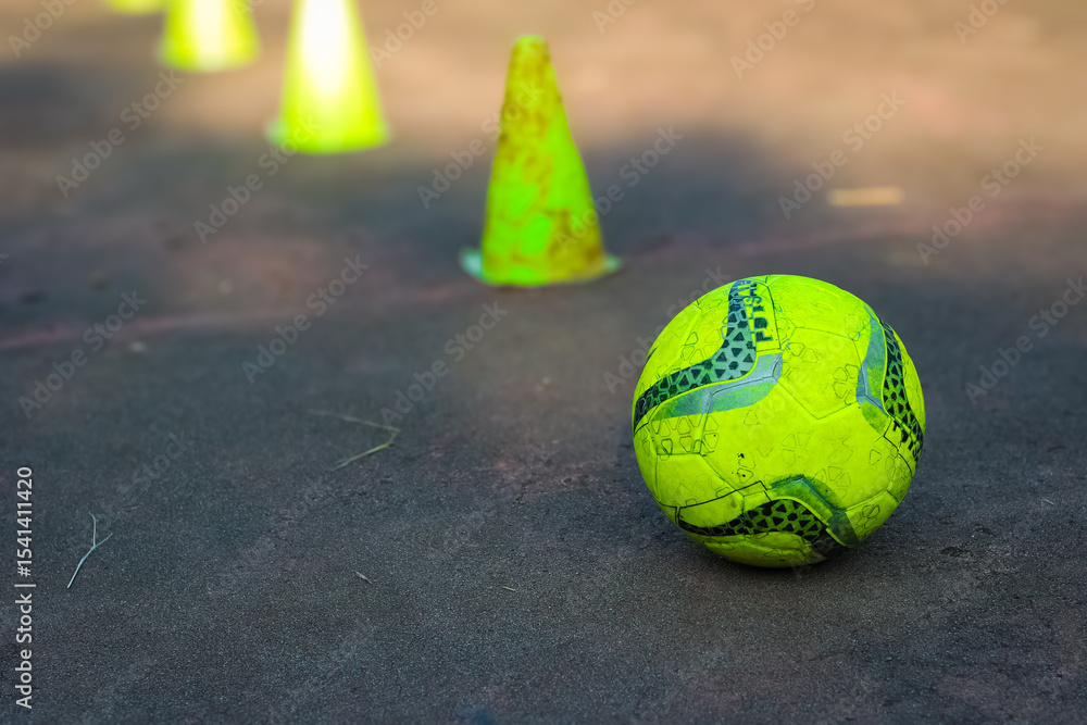 Soccer ball on ground, close up Soccer ball on ground, close up