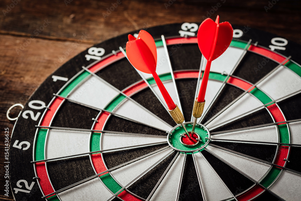 Darts Hitting the Bullseye on a Wooden Dartboard Game Darts Hitting the Bullseye on a Wooden Dartboard Game