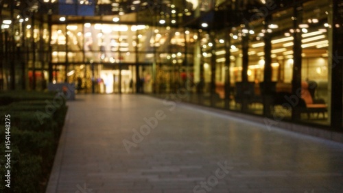 Canvas Print Blurred cityscape with bokeh lights illuminates a london street at night during winter, showcasing the vibrant urban environment in the united kingdom
