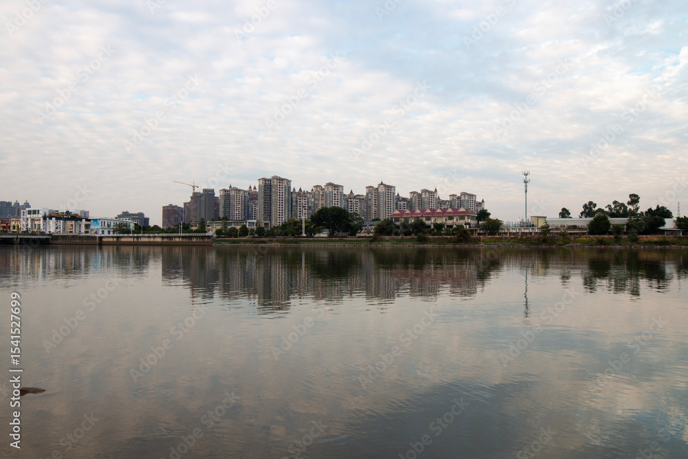 Naklejka premium sunset over the river