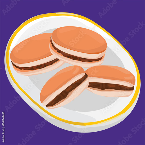 Traditional Japanese Dorayaki Pancakes with Red Bean Filling on a Plate

