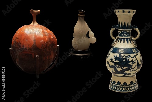 Canvas Print Three antique Asian vessels: a carved gourd, a jade bottle, and a porcelain vase with dragon motif