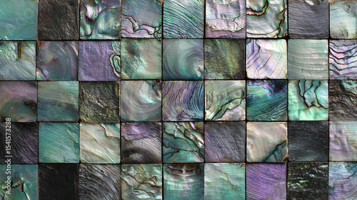 Square abalone shell. The color tone changes from green to purple with an iridescent effect. Each tile has unique colors and textures that resemble natural gemstones.