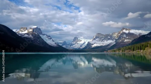 Mountain lake reflecting a cloudy sky