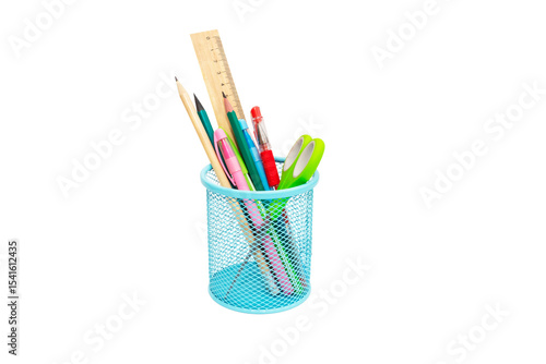 School and office supplies, pens, pencils, ruler, compass in a metal cup on a white background.