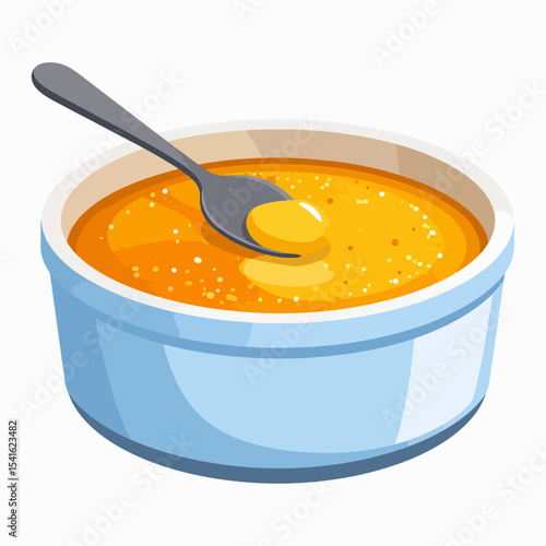 A dish of creme brulee with a spoon scooping out a bite featuring a blue bowl and creamy yellow dessert