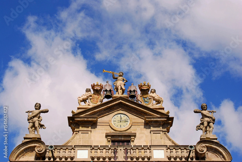 Details of the architecture on the upper part of the Pamplona City Hall building, Navarre. The city of Iruña Pamplona in Navarra, apart from its famous bullfighting festival, is a very rich city