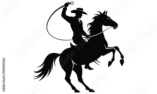 Silhouette of a cowboy riding a horse and throwing a lasso