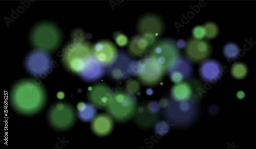 Multicolored blurred bokeh particles with violet, blue, pink hues floating on black background, creating festive or dreamy abstract composition.