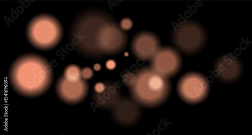 Orange blurred bokeh circles on black background with soft glow, imitating distant lights or defocused highlights in low-light environment.