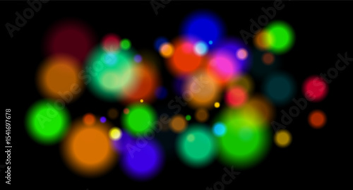 Multicolored glowing circles on dark background. Blurred soft shapes of various sizes create abstract festive atmosphere.