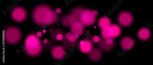 Purple blurred bokeh particles with varying size and opacity on black background. Abstract design element for festive or sci-fi scenes.