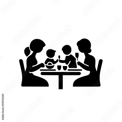 Families enjoying a meal together at a table with children in a welcoming atmosphere