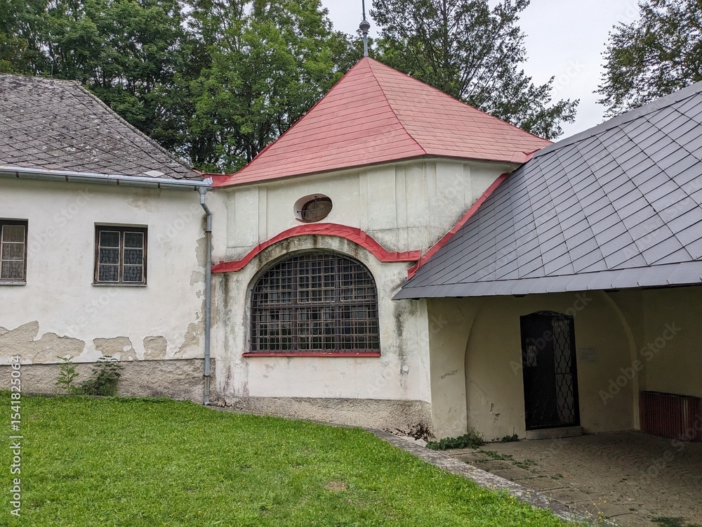 Fototapeta premium Kremesnik Hill monastery abbey in Vysocina, Bohemia, Czech Republic, featuring a historic church and lookout. A serene pilgrimage site offering breathtaking views of the surrounding landscape.Close by