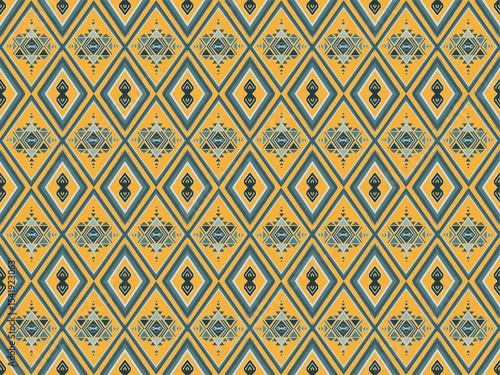 A bold and colorful Aztec diamond pattern with intricate details and vibrant tones, perfect for textiles, wallpaper background.