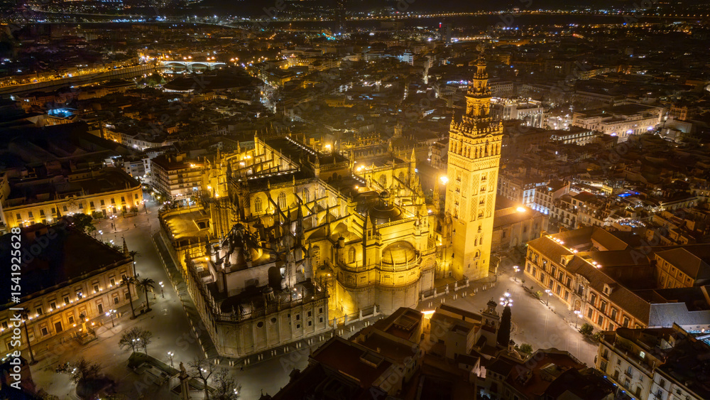 Naklejka premium Aerial Night View of Illuminated Historic Cathedral