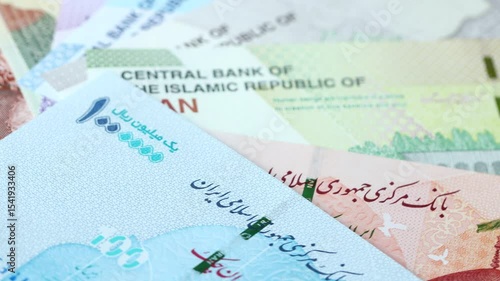 Iran money. Iranian currency exchange rate. Business concept. Iranian banknotes spinning around