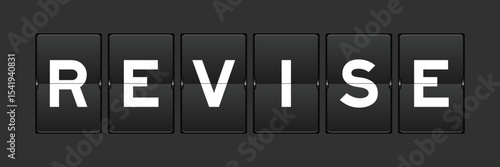 Black color analog flip board with word revise on gray background