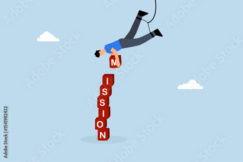 businessman hanging from above manages to complete task blocks.