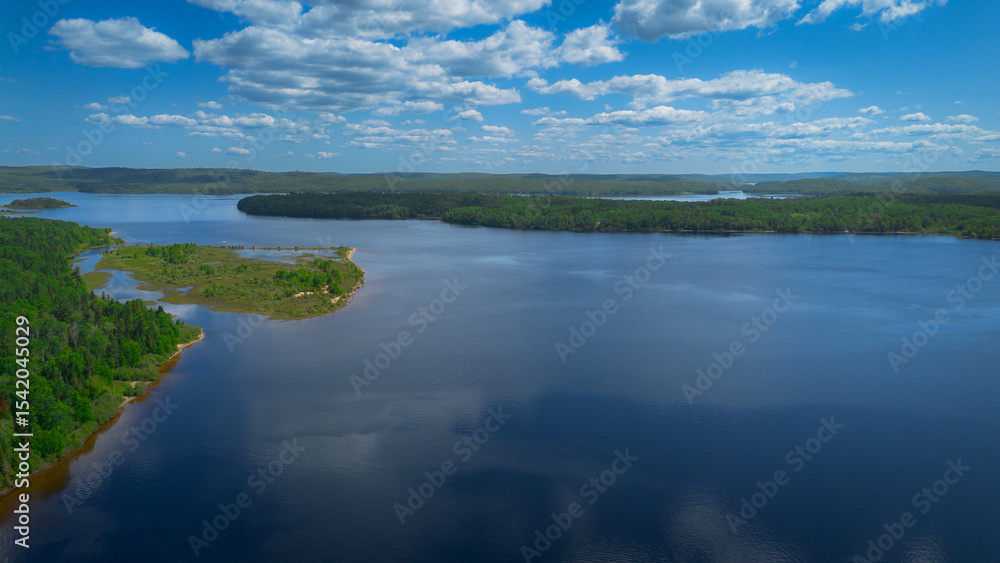 Fototapeta premium Aerial view of a large lake in the Canadian forest in Quebec in the Lanaudière region