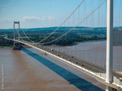 The old M48 Severn bridge from England to Wales.  Medium aerial shot