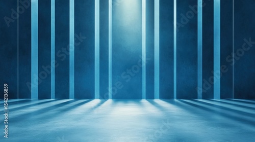 A blue studio space with vertical light columns and shadows