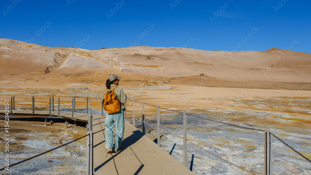 Fototapeta premium Exploring the geothermal wonders of Hverir Icelands breathtaking landscapes with vibrant colors