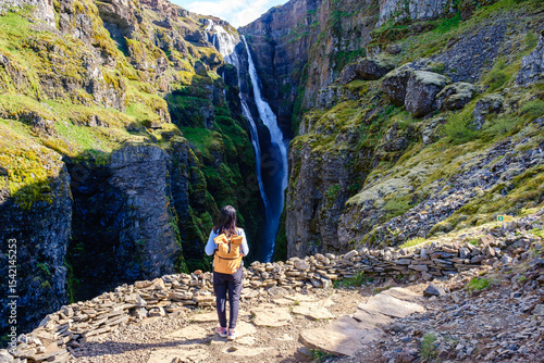 Obraz na płótnie Witness the majestic Glymur Waterfall cascading down cliffs in Icelands stunning