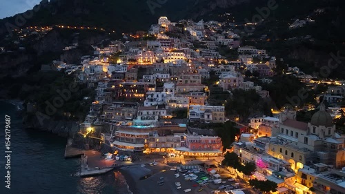 Drone view of Positano at night on Amalfi Coast, Italy