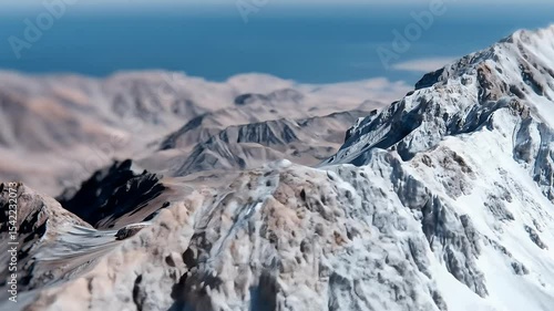 Mountain range with snow and rock formations