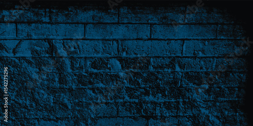 Background of a neglected urban area, featuring a weathered and stained wall saturated in an intriguing blue.
