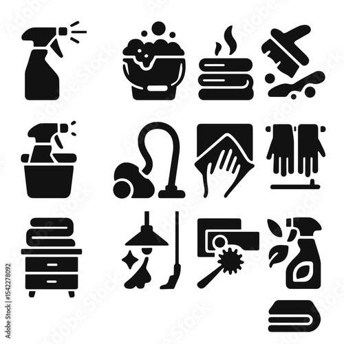 Home Cleaning Icons. Solid style icons of home cleaning: water sprayer misting icon, soapy water bucket icon, towel stack with