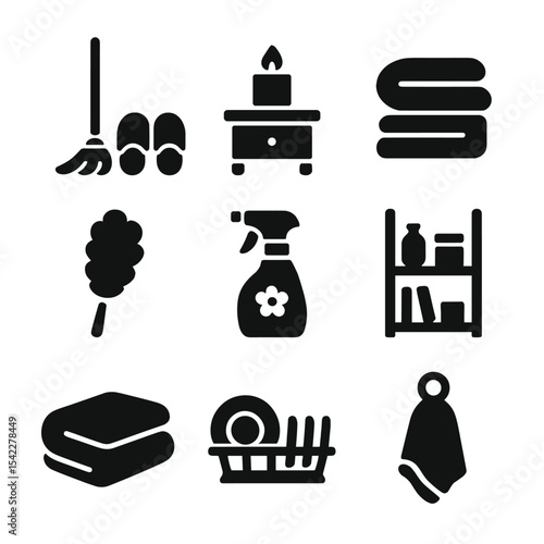 Cozy Cleaning Icons. Solid style icons of cozy cleaning routines: mop and slippers, candle on counter, folded laundry, soft duster