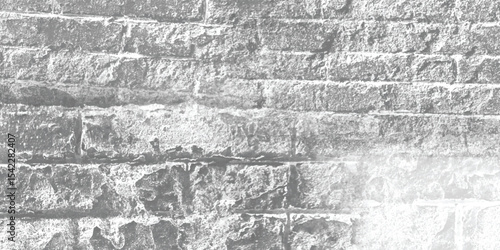 Abstract pattern created by the repetition of blocks or bricks on an old wall, inviting contemplation of form.
