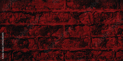 Aged and cracked wall surface in a deep red, offering a detailed study of material degradation and natural wear within the shadows.
