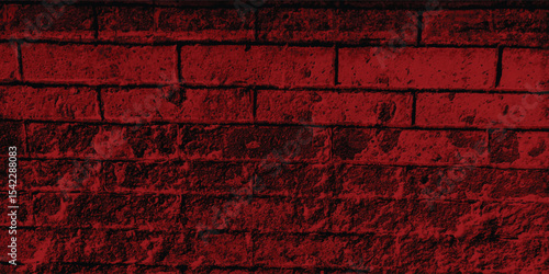 Close-up of a decorative concrete block wall in a deep red, highlighting its geometric pattern and textural depth within the shadows.
