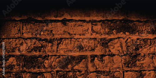 Close-up of a decorative concrete block wall in a deep reddish-brown, highlighting its geometric pattern and textural depth with a shadow.
