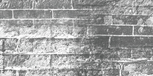 Vertical and horizontal lines of a textured wall, creating a strong sense of structure and orderly repetition.
