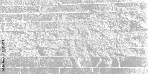 Dark grey masonry exhibiting strong horizontal and vertical joints, creating a repetitive yet visually appealing structural pattern.
