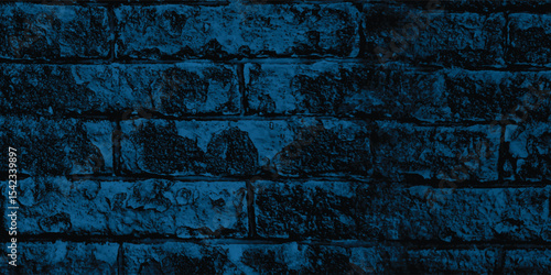 Solid textured wall immersed in deep blue, perfect for creating impactful and emotionally resonant backgrounds.
