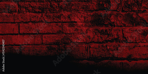Rustic block wall illuminated by a dark, intense light, revealing its intricate structure and time-worn imperfections with deep shadows.
