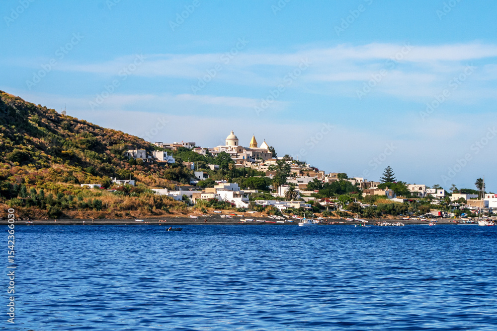 Fototapeta premium A picturesque coastal village on an Italian island overlooking the Mediterranean Sea.
