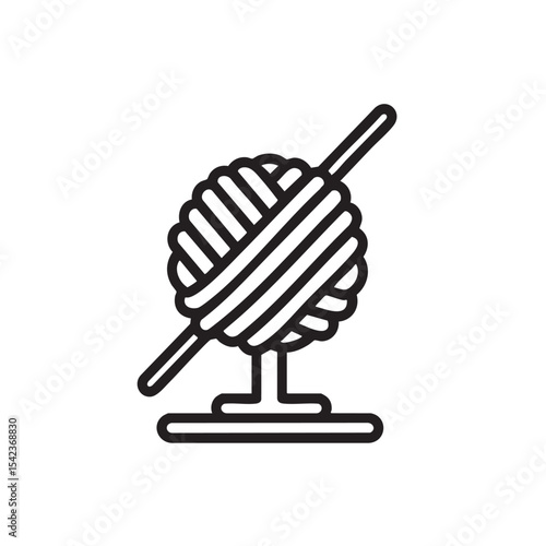 Yarn ball and knitting needles for creative crafting projects