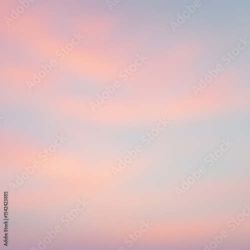 Abstract image of a dreamy sky in soft pink and blue tones  capturing peaceful twilight light in minimal aesthetic..