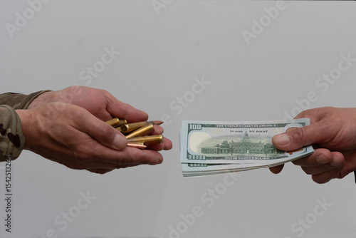 The exchange of ammunition for money. Concept of illegal arms trade, criminality, corruption in the army.