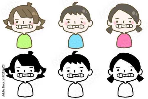 しかめっ面で嫌そうな顔をする子ども