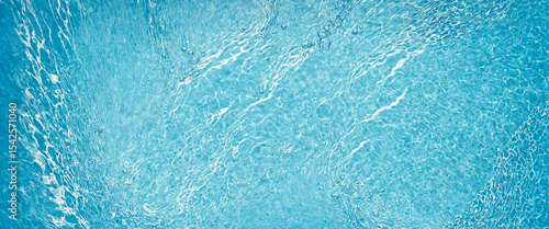 serene light blue water sur...