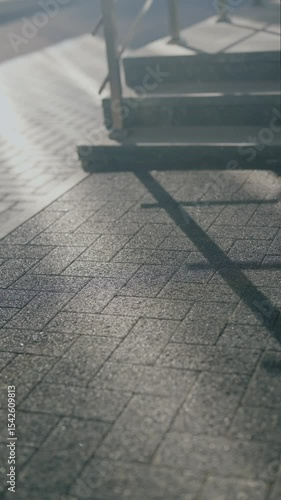 Wallpaper Mural Woman in white dress and gold high heels walks down steps on sunny day. Stylish outfit. Urban fashion. Elegant shoes. Summer vibes. Confident walk. Torontodigital.ca